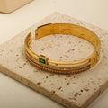 Emerald Crystal Gold-Tone Bangle ✨